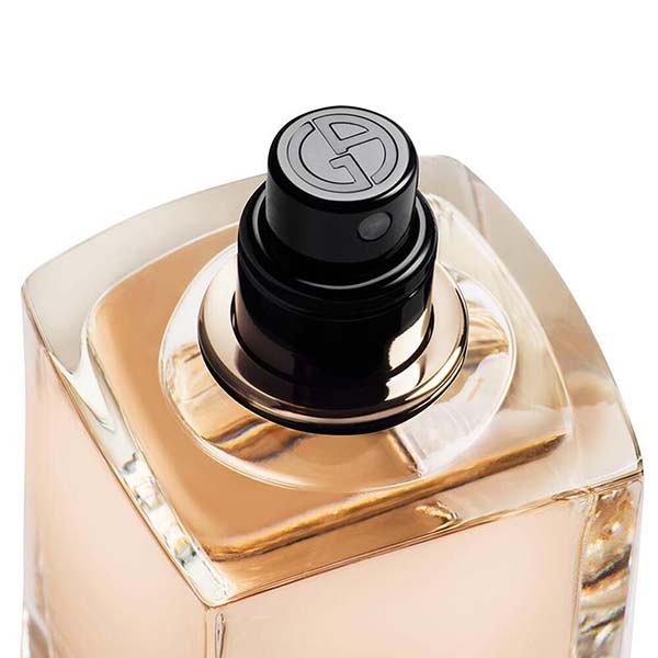 Giorgio Armani Si Perfume bottle close up of logo on spray nozzle 