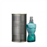 Jean paul gaultier le male perfume bottle next to packaging tin