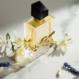 yves saint laurent libre bottle amongst notes of lavender and vanilla